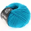 A ball of turquoise yarn with a label. Produktbild-Vorschau
