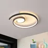 A modern spiral LED ceiling light is shown mounted on a white ceiling. Produktbild-Vorschau