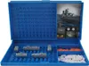 A blue Battleship game board with ships and game pieces laid out. Produktbild-Vorschau