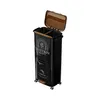 A black, multi-compartment trash can with a brown lid and wooden accents, shown from a slightly elevated front-side angle against a white background. Produktbild-Vorschau