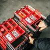 Hands are shown organizing a modular tool organizer system. Anteprima dell’immagine prodotto