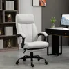 A light gray office chair with a footrest is shown in a home office setting, with bookshelves in the background and a desk with a computer monitor to the right. Náhled obrázku produktu