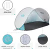 A pop-up beach tent with callouts highlighting its features. Produktbild-Vorschau