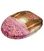 A toilet seat with a printed image of a path covered in pink flowers. Náhled obrázku produktu