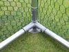 Close-up of the corner joint of a green net enclosure with metal poles. Voir les images du produit