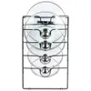 A black metal rack holding five glass pot lids with silver handles. Produktbild-Vorschau