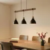 Lindby Hängeleuchte Trebale, E27, Ø 28 cm, 3-flammig, Holz Produktbild-Vorschau 2