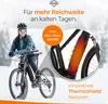 A woman on an e-bike in a snowy environment, with a close-up of the battery area highlighted. Anteprima dell’immagine prodotto