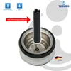 A close-up view of a sink drain basket with a tool inserted, against a white and gray background with branding and feature callouts. Produktbild-Vorschau