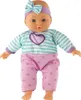A baby doll standing against a white background. Podgląd zdjęcia produktu
