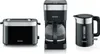 A collage of three black kitchen appliances: a toaster, a coffee maker, and a kettle, all with silver accents. Produktbild-Vorschau