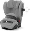 A gray child car seat is shown from a slightly elevated front-side angle against a white background. The car seat has adjustable headrest and a padded seat. A graphic element on the right side of the car seat indicates sound waves emanating from a small ci Náhled obrázku produktu