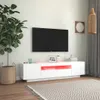 A modern living room with a TV stand and a large plant. Anteprima dell’immagine prodotto