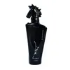 A black perfume bottle with a horse head cap. Voir les images du produit