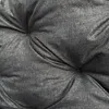 A close-up view of a tufted dark gray cushion, showing the texture of the fabric and the stitching. Náhled obrázku produktu