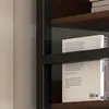 A close-up view of books on a shelf. Produktbild-Vorschau