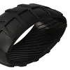 A close-up, isolated shot of a black rubber wheel tread. Produktbild-Vorschau