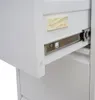 A close-up view of a white filing cabinet drawer slide and a plastic clip. Anteprima dell’immagine prodotto