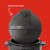 A close-up view of the lid of an Instant Pot being lifted, with text indicating an instruction. Anteprima dell’immagine prodotto