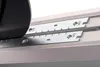 A close-up view of a cutting mechanism for vinyl and laminate flooring. Produktbild-Vorschau