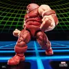A toy action figure of Juggernaut against a digital grid background. Podgląd zdjęcia produktu