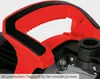A close-up view of the red and black handle of a garden pump. Anteprima dell’immagine prodotto