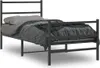 A black metal bed frame with a mattress and bedding. Náhled obrázku produktu
