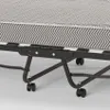 A close-up view of the frame and mattress of a folding bed. Anteprima dell’immagine prodotto