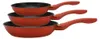 A stack of three red frying pans with black interiors and speckled detailing, each with a red handle, are shown against a white background. Produktbild-Vorschau
