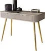 A beige console table with gold legs and decorative items on top. Náhled obrázku produktu