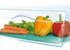 Vegetables on a cutting board inside a clear container. Anteprima dell’immagine prodotto