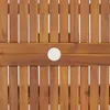A close-up view of a wooden table surface with a hole in the center. Podgląd zdjęcia produktu