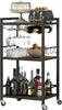 A multi-tiered serving cart filled with various items like bottles, glasses, a toaster, and fruit. Produktbild-Vorschau