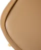 A close-up view of the corner of a khaki-colored upholstered chair, showing the curved edge and a hint of a wooden leg. Voir les images du produit