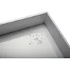 A close-up view of the corner of a white tray with some water droplets on it. Anteprima dell’immagine prodotto
