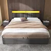 A modern bedroom with a large bed, nightstands, and wood-paneled walls. Produktbild-Vorschau