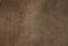 A close-up view of a textured surface, likely a tabletop or flooring. Produktbild-Vorschau