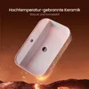 A ceramic sink is shown floating above a fiery, rocky surface, with text overlay describing its material and properties. Voir les images du produit