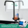 A black kitchen faucet is shown in a sink area, with a window in the background. The faucet is depicted in two positions to illustrate its 360-degree rotation. A diagram shows the hot and cold water controls. A close-up inset shows a filter component. Produktbild-Vorschau