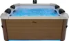 A hot tub filled with bubbling blue water, set against a white background. Produktbild-Vorschau