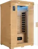 An open infrared sauna cabin made of wood, with interior lighting and heating elements visible. Produktbild-Vorschau