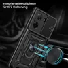 A black phone case with a ring holder and a magnetic car mount adapter is shown in a close-up shot. Produktbild-Vorschau