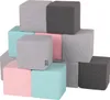 A stack of colorful foam blocks arranged in a pyramid shape. Produktbild-Vorschau