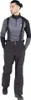 A man wearing ski pants and a ski top, standing against a white background. Voir les images du produit