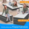Multiple views of a foldable mattress, with people interacting with it in different ways. Produktbild-Vorschau
