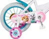Close-up of the rear wheel and chain guard of a child's bicycle, featuring Paw Patrol characters. Náhled obrázku produktu