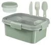 A lunch kit with a rectangular container, a small round container, and cutlery. Náhled obrázku produktu