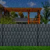 A dark gray privacy screen is installed in a garden, with a wooden pergola and house in the background, under a rainy sky. Produktbild-Vorschau