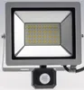A studio shot of an LED floodlight with a motion sensor. Produktbild-Vorschau