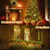 A split image showing a Christmas tree and fireplace indoors on the top half, and a balcony decorated with lights outdoors on the bottom half. Produktbild-Vorschau